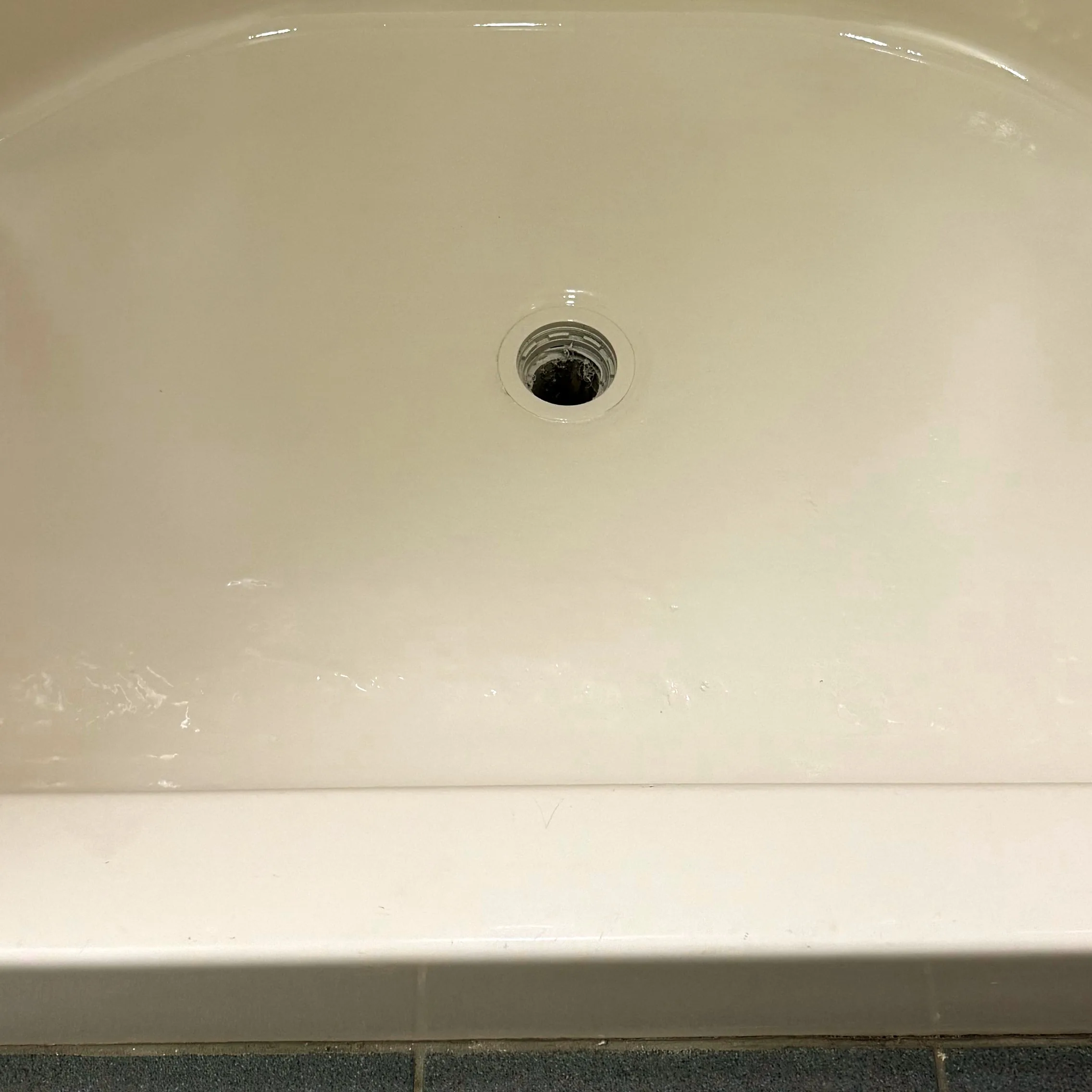 Fiberglass tub floor professionally repaired
